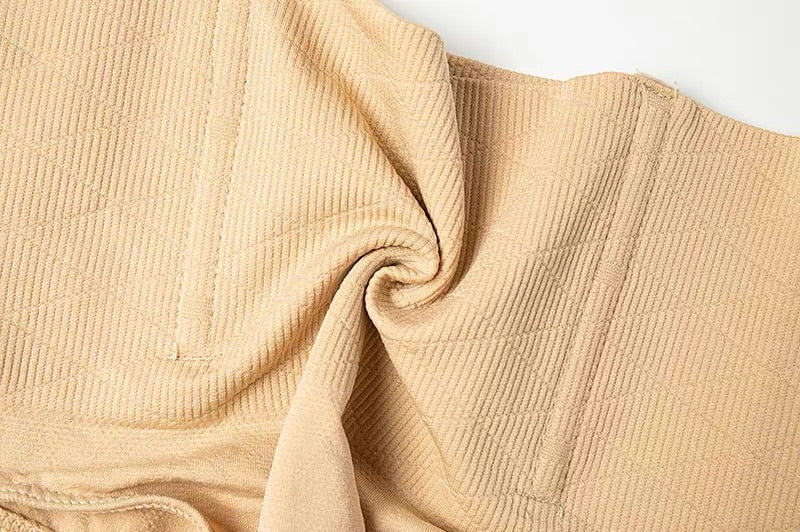 Close-up of the boning panels and seamless knit fabric